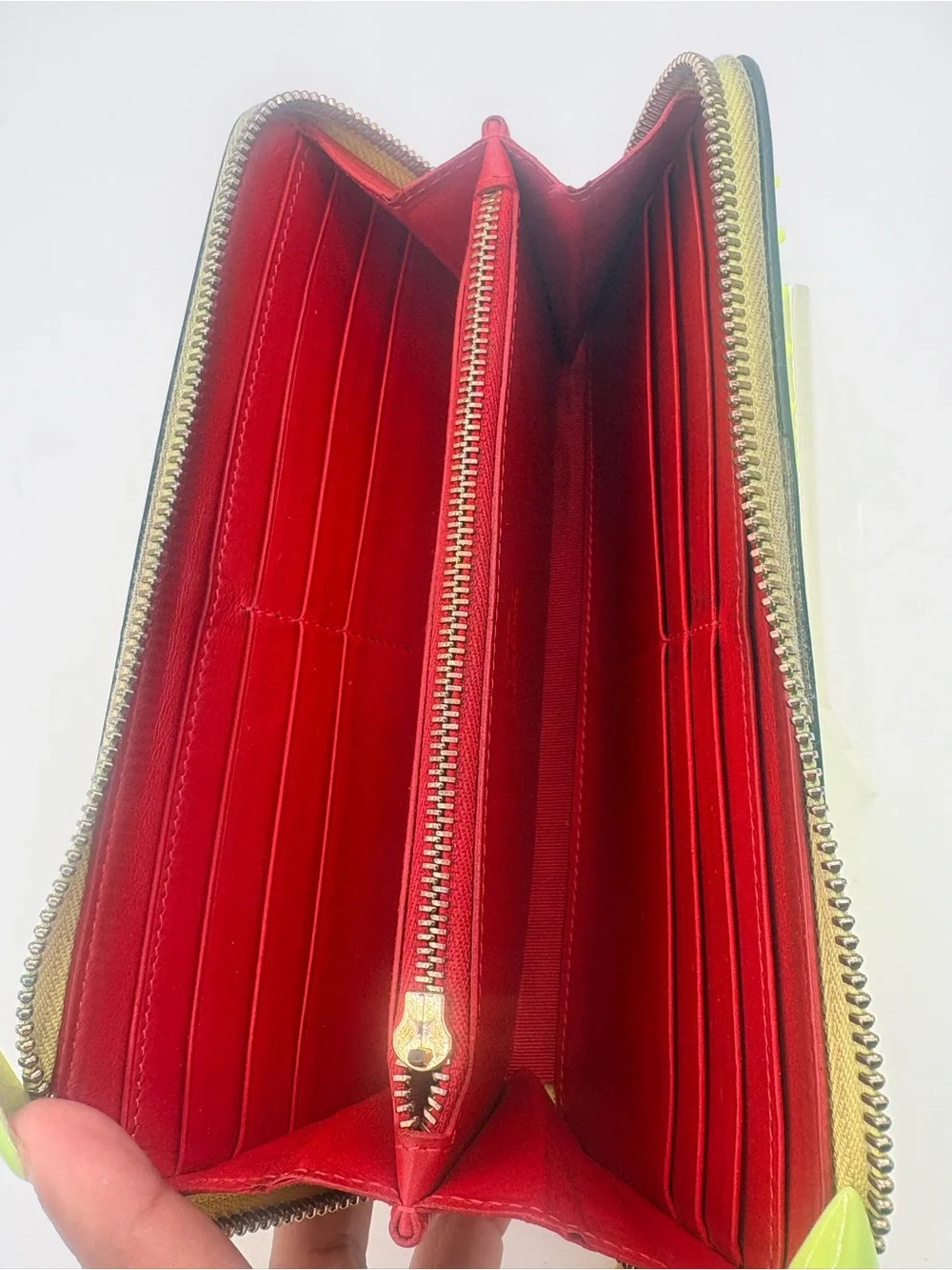 Christian Louboutin neon wallet